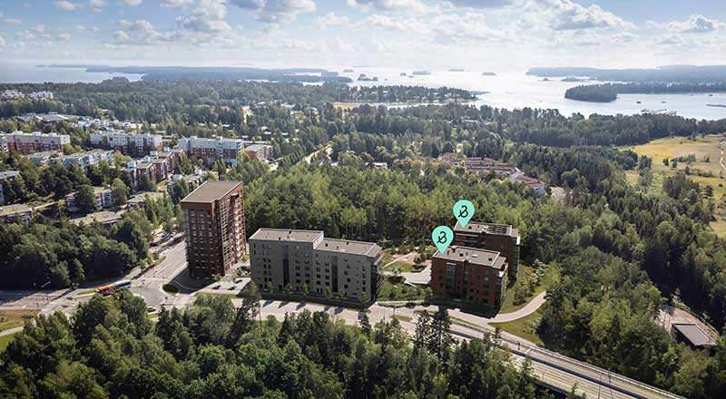 Espoon Tiira Ilmakuva Espoon Tiirasta Tiistilässä: asuinkohde metsän ympäröimänä, taustalla pientalo- ja kerrostaloalueita sekä merellinen maisema.