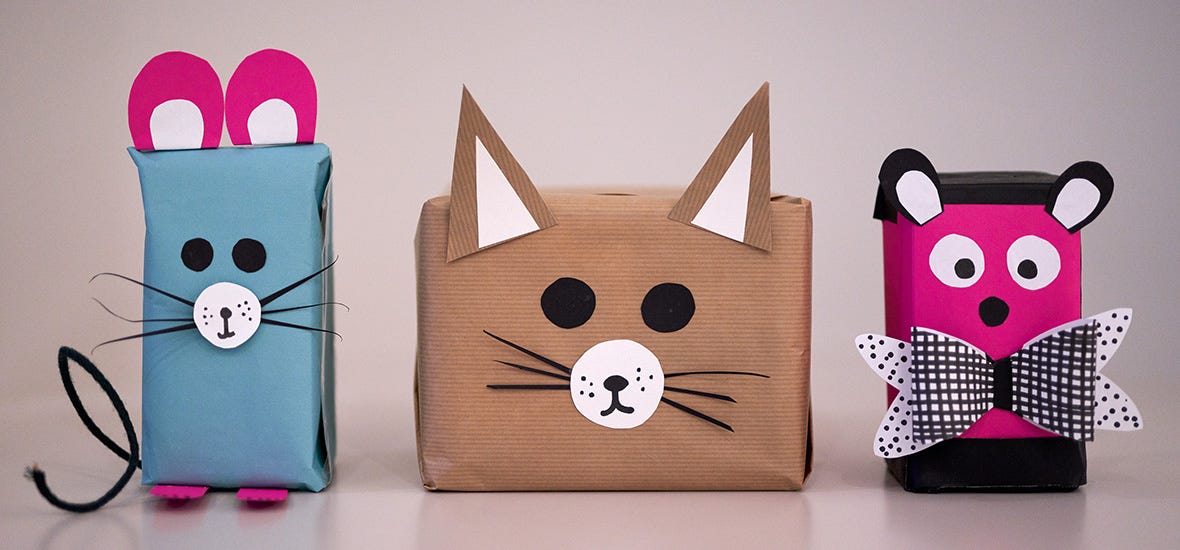 Nämä paketit syntyivät paperikasseista. Kantokahvana toiminut naru muuntuu hiiren hännäksi käden käänteessä.