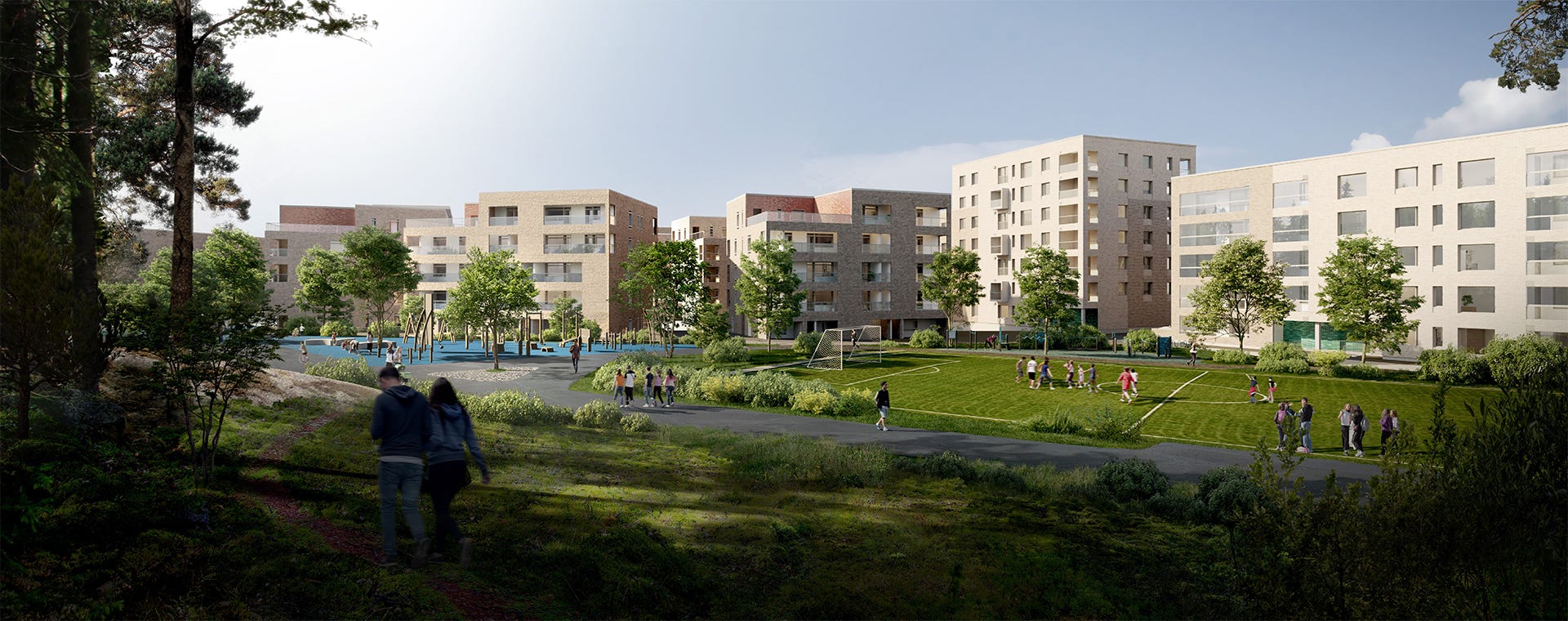 Vehreä asuinalue, jossa modernit kerrostalot ympäröivät yhteisöllistä piha-aluetta. Etualalla kävelytie, keskellä viheralue, jalkapallokenttä ja leikkipaikka. Asukkaat nauttivat ulkoilusta ja yhdessäolosta luonnonläheisessä ympäristössä.