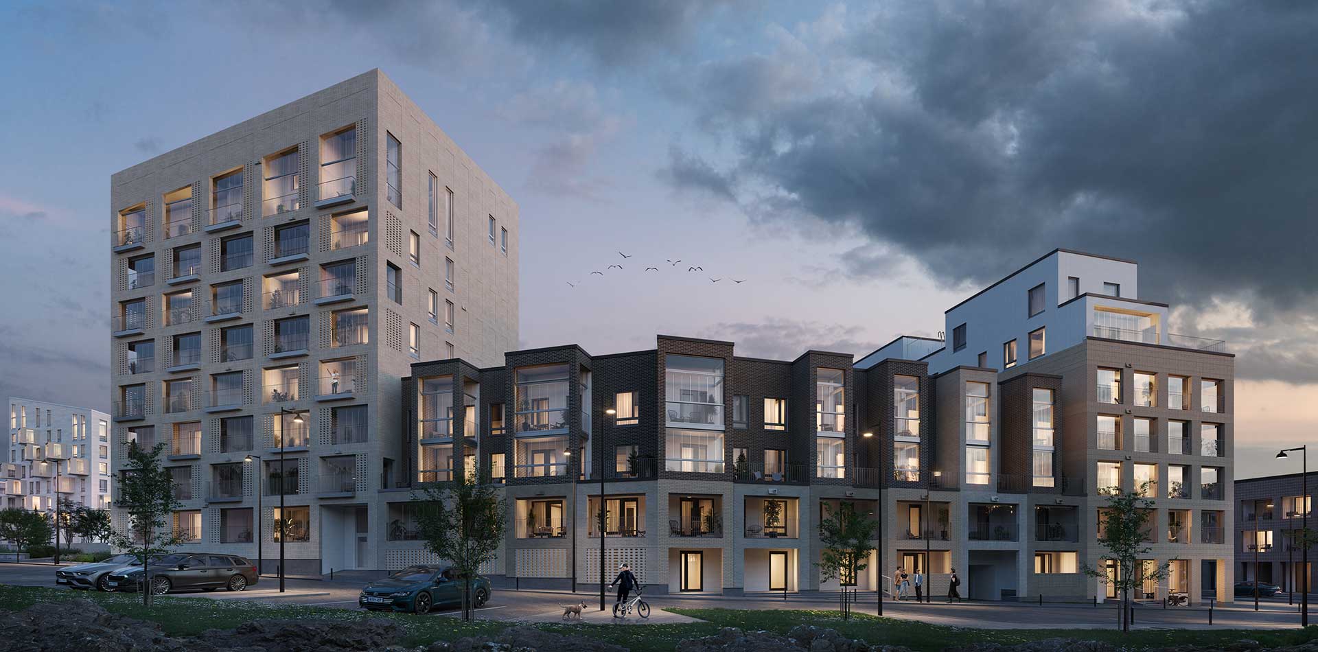 Havainnekuva Bonavan rakentamasta Renata-korttelista Kruunuvuorenrannassa iltavalaistuksessa.