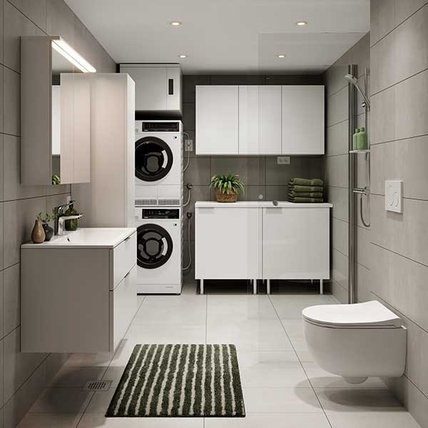 Tampereen Vienon kylpyhuone ja kodinhoitotila, laatoitetut pinnat, pesutorni, säilytyskaapistot ja seinä-wc.