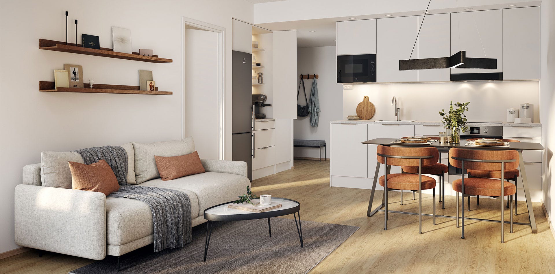  Vaalea ja moderni avokeittiö yhdistyy saumattomasti olohuoneeseen. Jääkaapin vieressä on käytännöllinen aamiaiskaappi, ja ruokapöytä neljälle tuo tilaan kodikasta rytmitystä. 